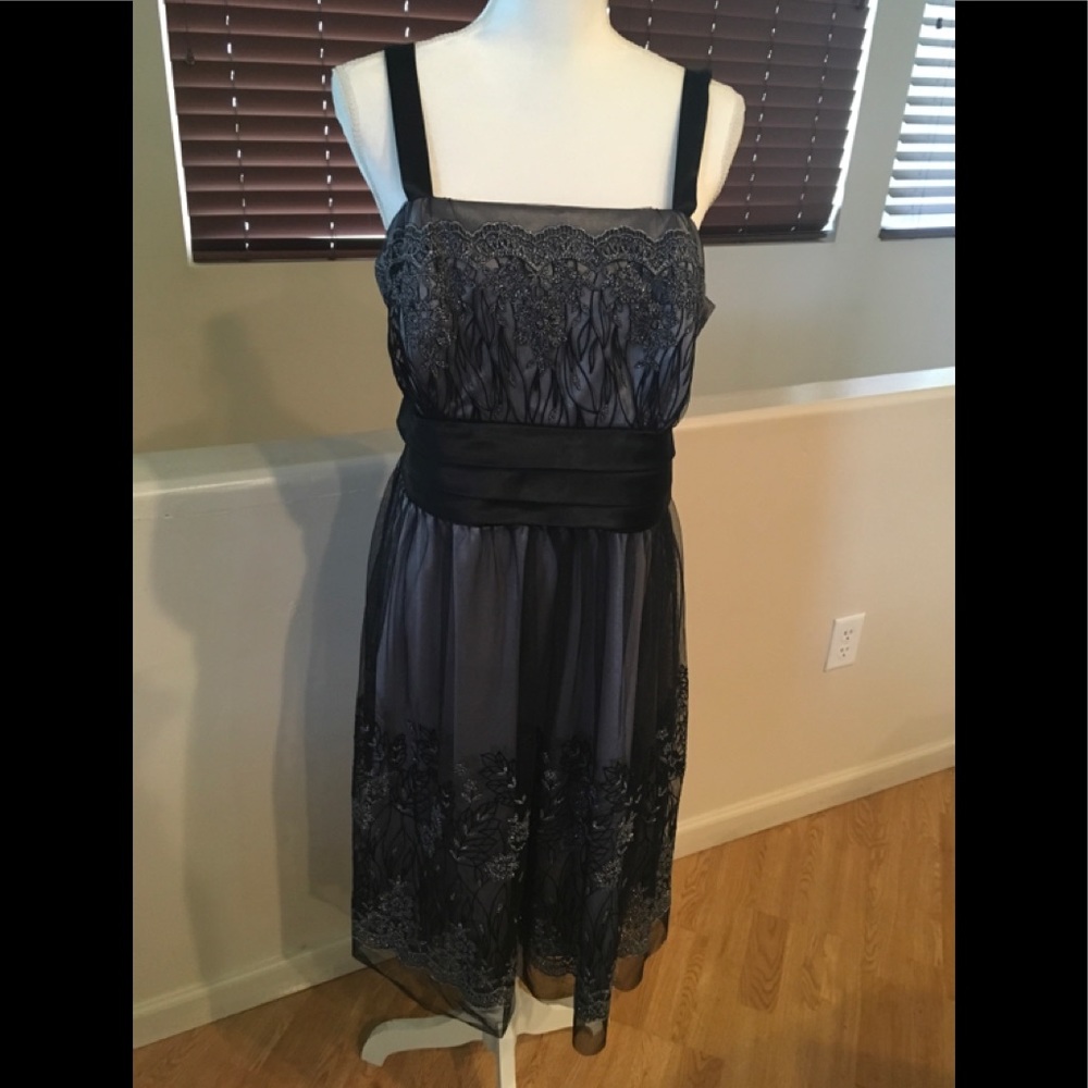 Black and sparkle netting cocktail dress.